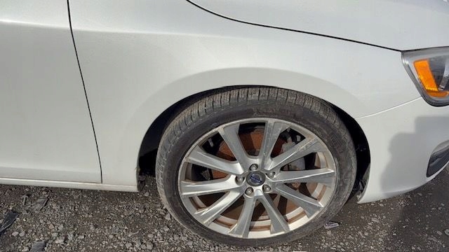 VOLVO S60 V60 LIFT BŁOTNIK PRAWY PRZÓD PRZEDNI 707