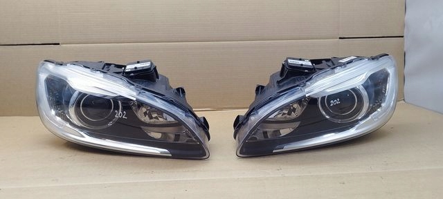 VOLVO S60 II V60 LAMPA PRAWA LEWA BIXENON SKRĘTNY 31420253 31420254 KOMPLET